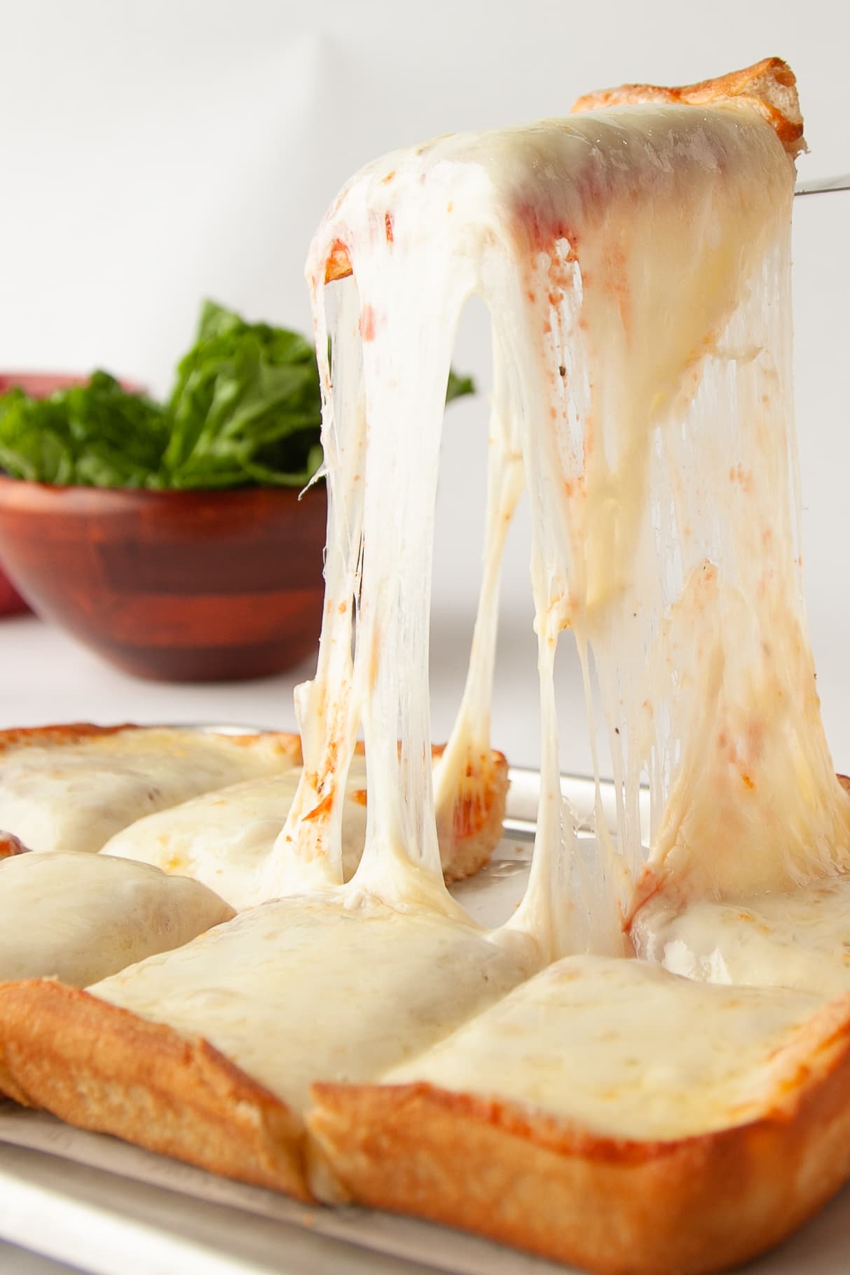 Pizza Oven cheese pull — handcrafted since 1956